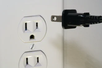 A plug socket and a nearby plug